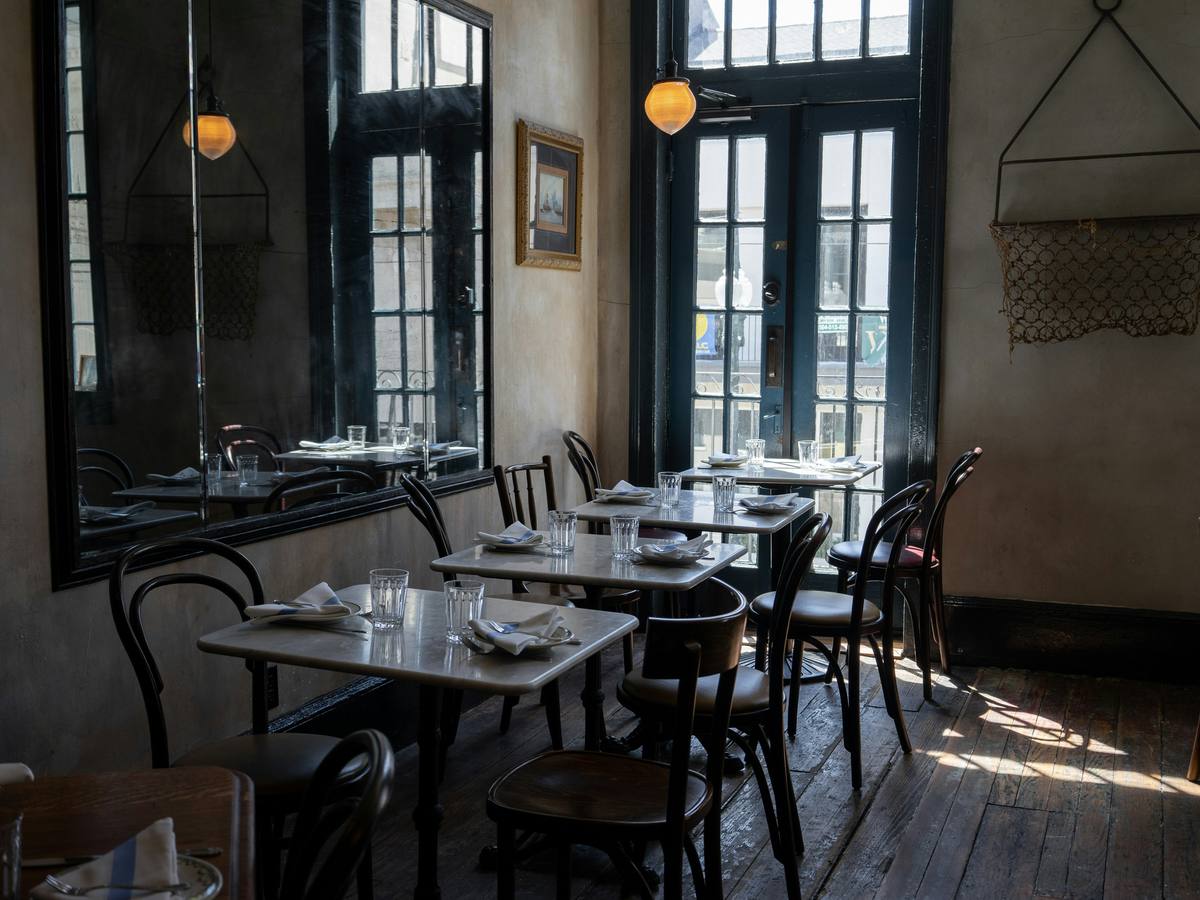An empty café dining room in the afternoon light